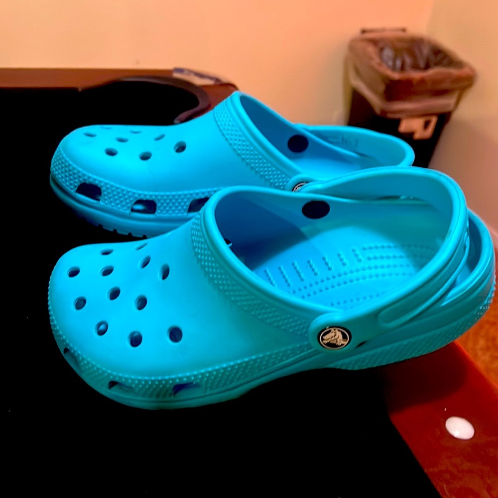 Gently used teal crocs